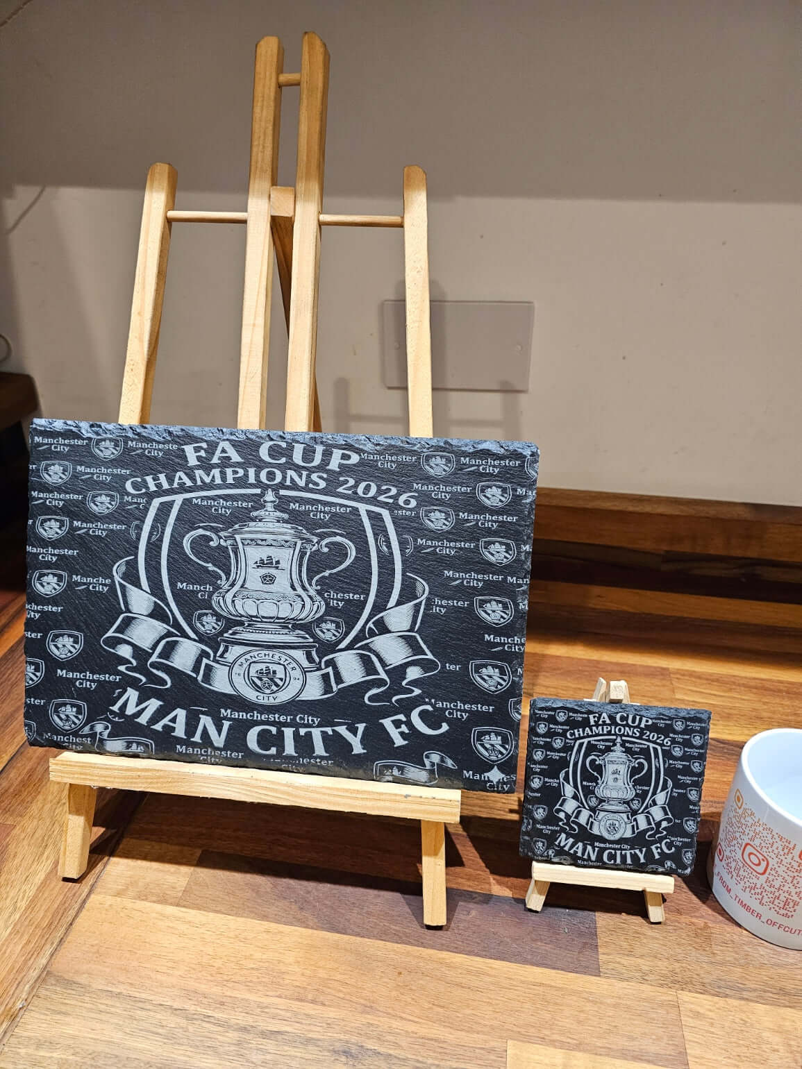 Manchester City FA Cup Champions 2026 Slate Coaster displayed on an easel, showcasing its premium engraving.