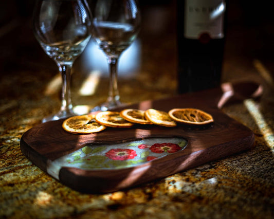 Mastering Basic to Advanced Techniques for Handmade Chopping Boards with decorative platter and wine glasses.