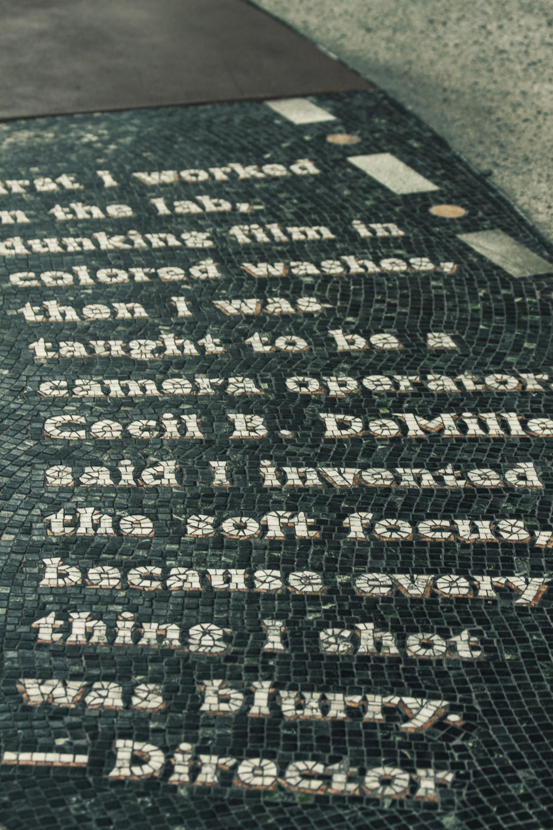 a close up of a sign on the ground