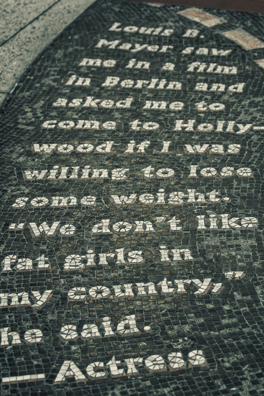 a memorial with a poem written on it