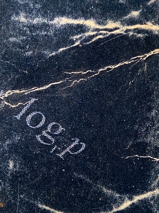 a close up of a black and white marble surface
