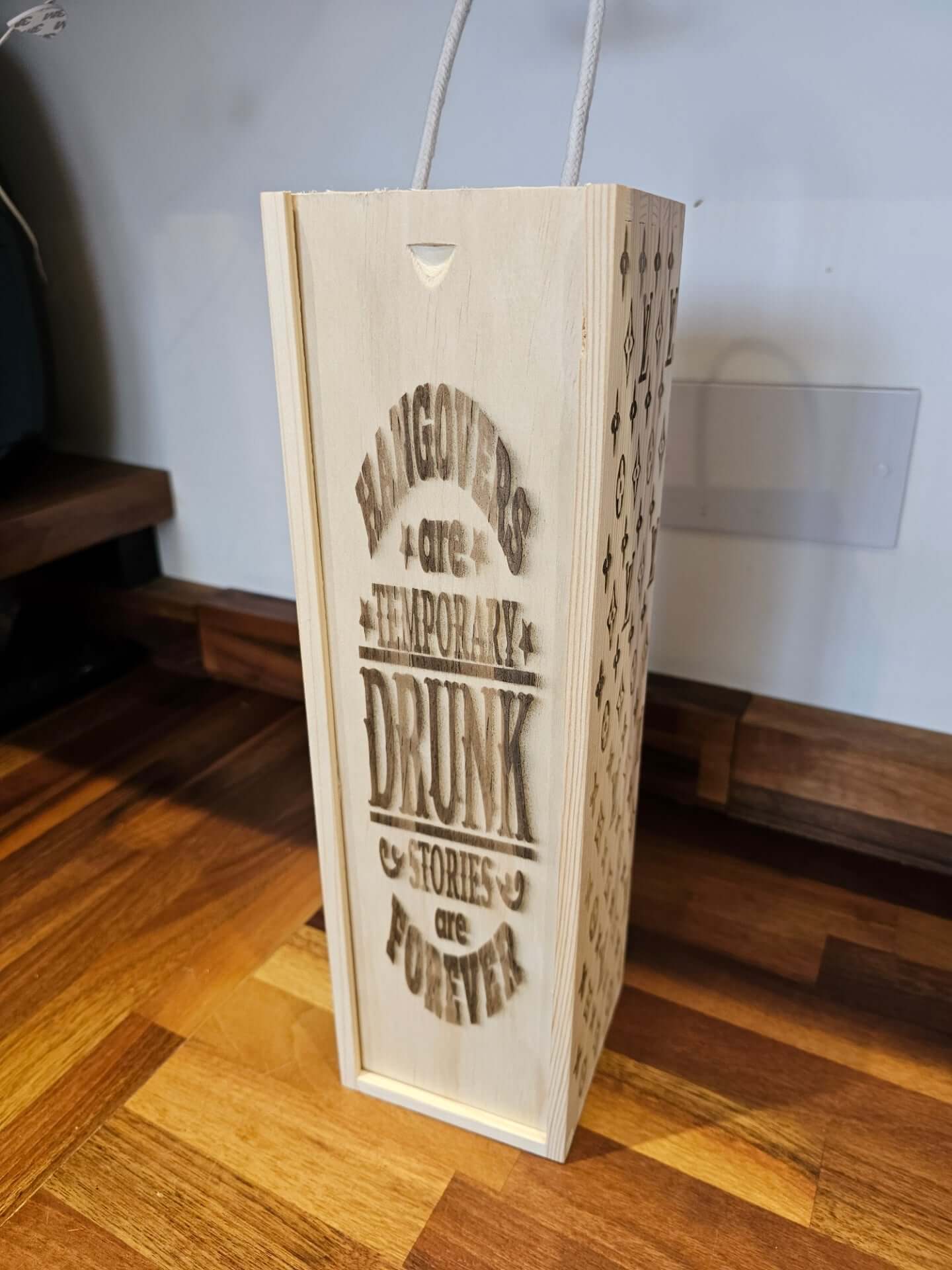Wine Bottle Boxes with humorous engraving about hangovers and drunk stories, crafted from natural wood for a luxury feel.