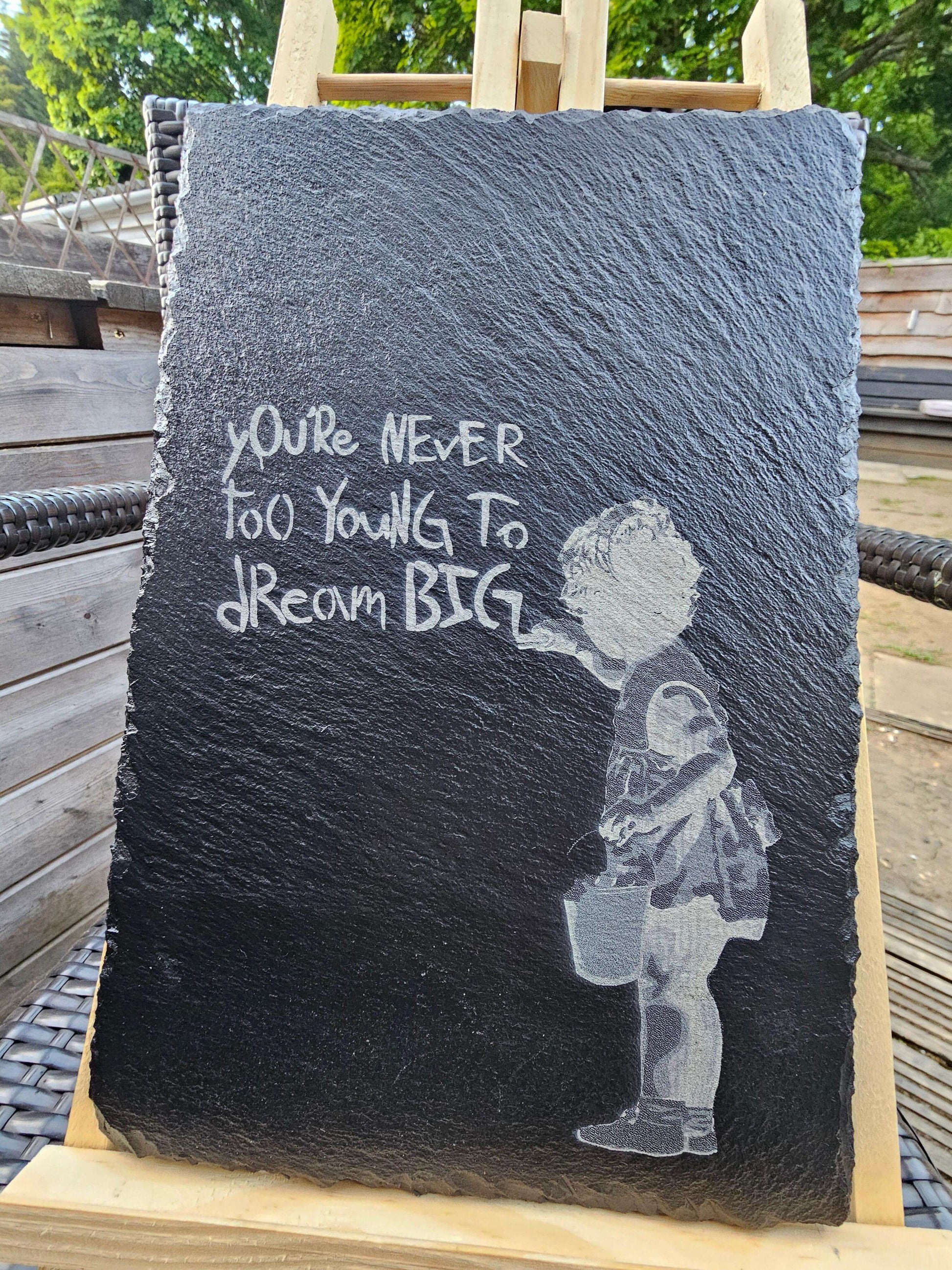 slate. You’re Never Too Young to Dream Big” – Laser Engraved Banksy