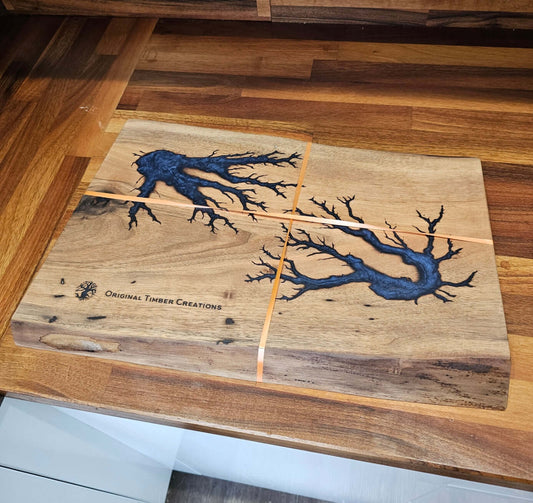 Handcrafted Resin Inlaid Wooden Board showcasing deep blue resin inlays and natural wood grain design from Original Timber Creations.