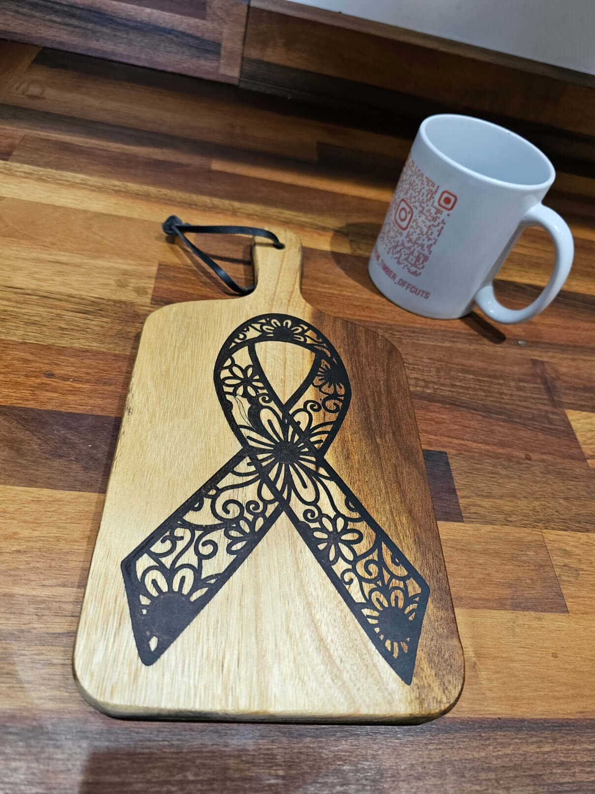 Floral Awareness Ribbon Engraved Wooden Serving Board – 28cm x 14cm with detailed ribbon design on wooden surface.