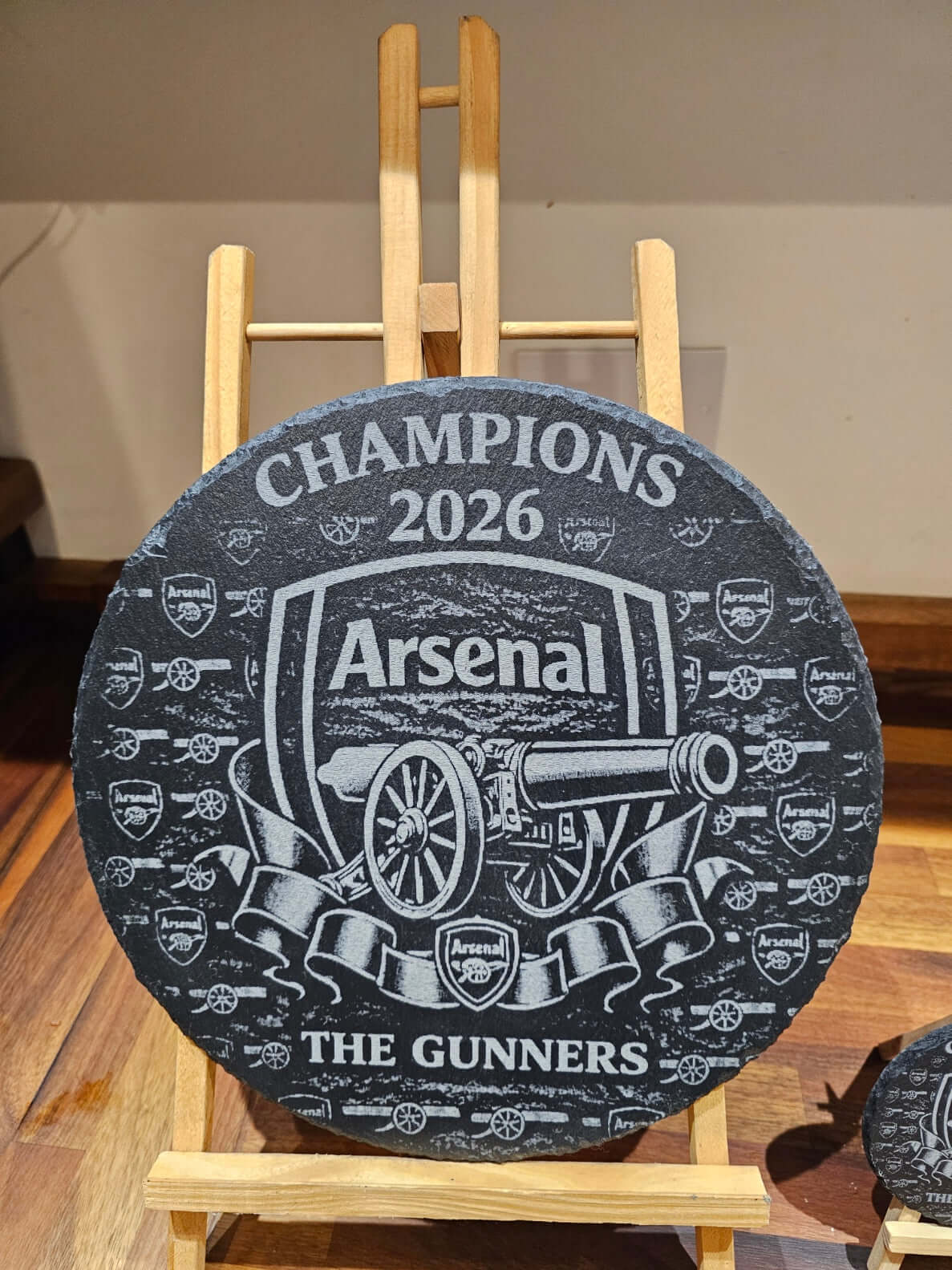 Arsenal Champions 2026 Engraved 300mm Round Slate Plaque Memorabilia with intricate design and display stand