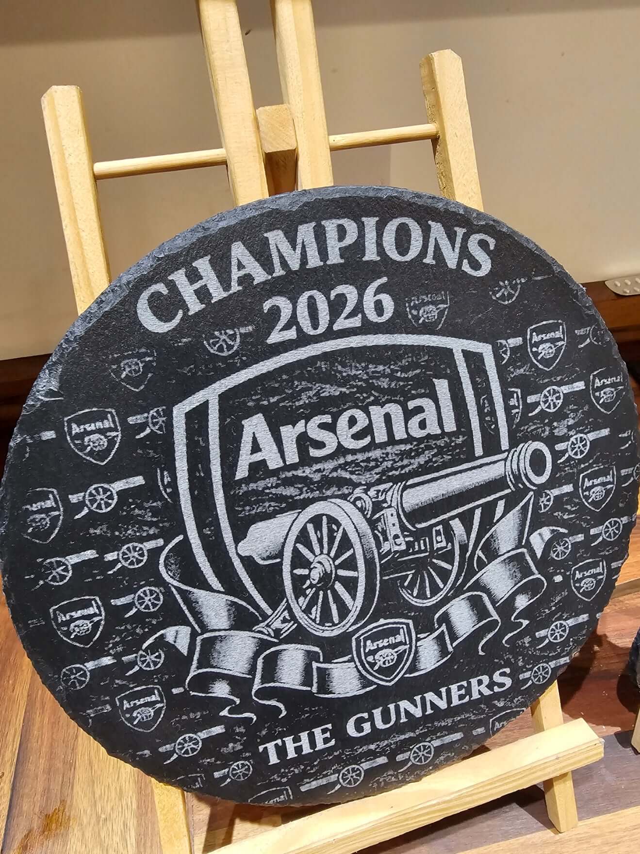 Arsenal Champions 2026 Engraved 300mm Round Slate Plaque Memorabilia showcasing intricate design and craftsmanship.