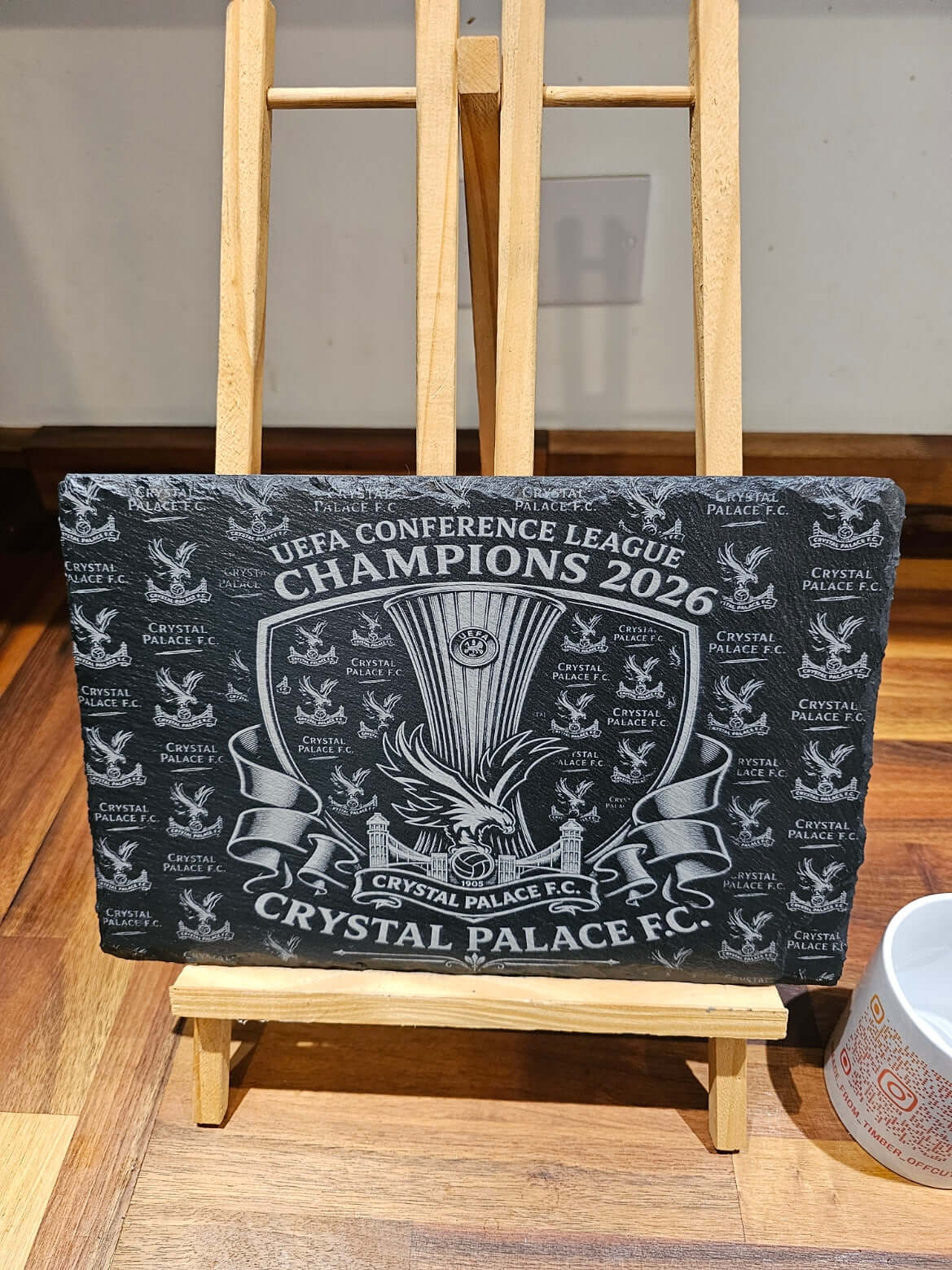 Crystal Palace UEFA Conference League Champions 2026 engraved slate plaque on display.