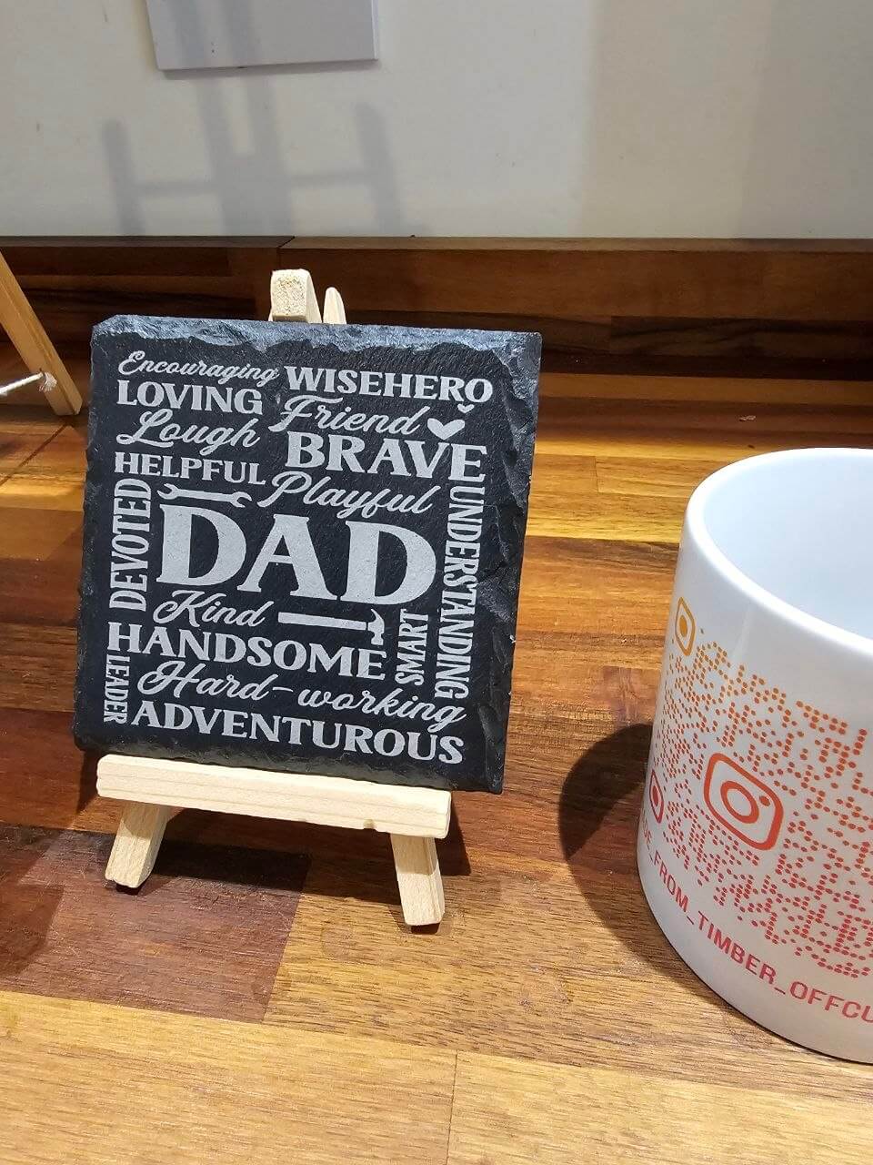 Slate Coasters dad on display with words describing qualities like Strong, Loving, Brave, and Kind.