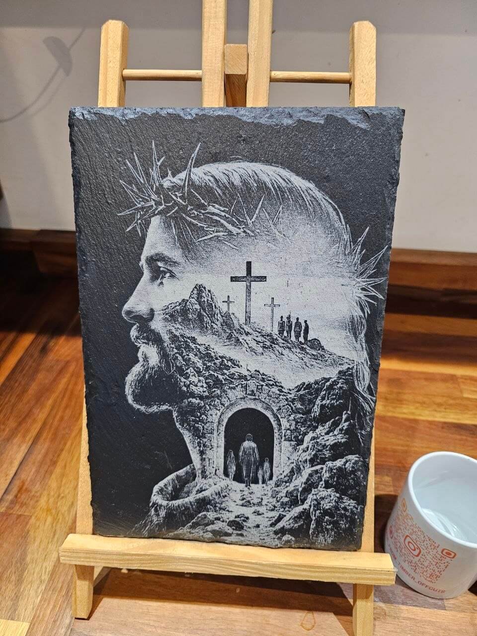 Slate plaque featuring Jesus with a crown of thorns and a cross, artistic Christian wall decor.