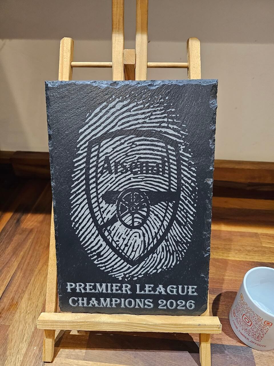 Arsenal Premier League Champions 2026 Fingerprint Plaque on display with laser engraved design.